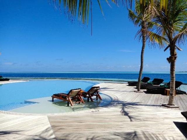Отель Komandoo Maldive Island Resort 4*