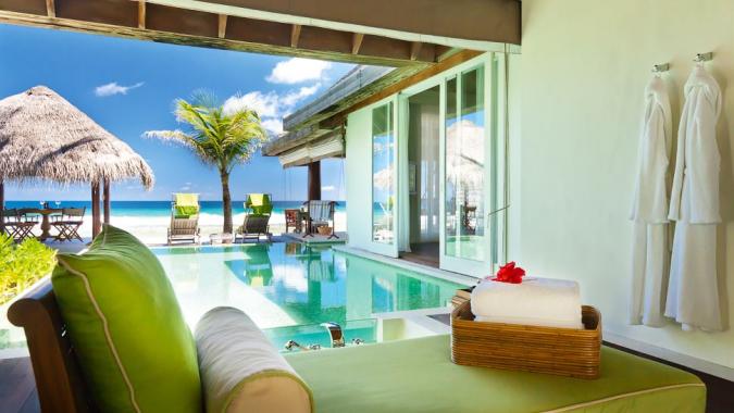 Отель Naladhu Resort Maldives